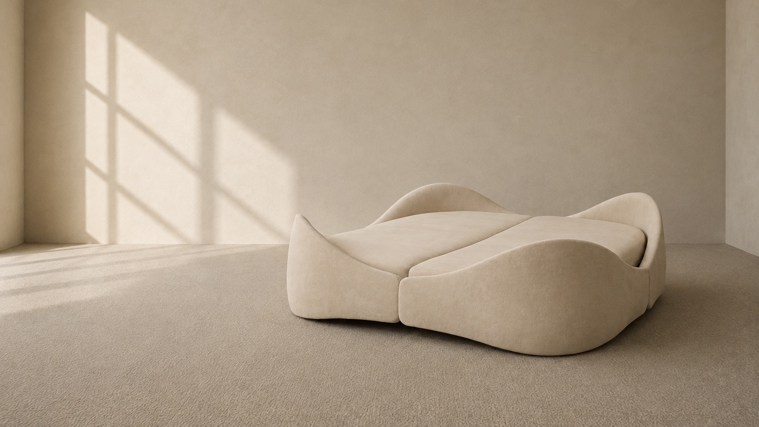 Sculptural cream upholstered sofa
